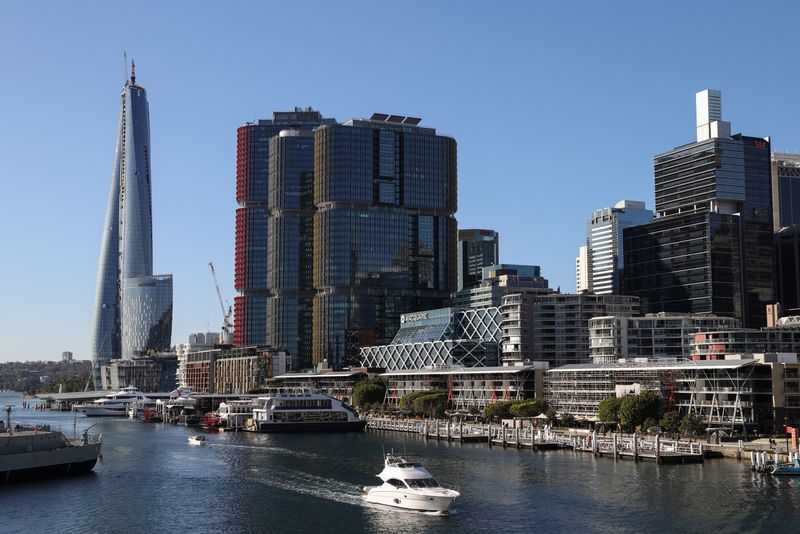 © Reuters. FILE PHOTO: A boat navigates Darling Harbour past the Central Business District waterfront as the state of New South Wales continues to report low numbers for new daily cases of the coronavirus disease (COVID-19), in Sydney, Australia, August 28, 2020. REUTERS/Loren Elliott/File Photo