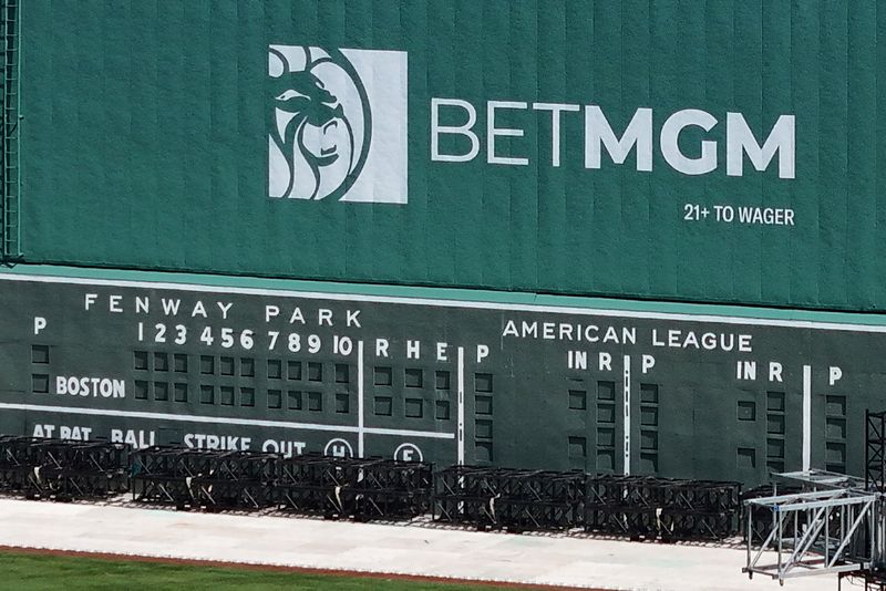 © Reuters. FILE PHOTO: A drone view shows an advertisement for the online sports betting company BetMGM at Fenway Park in Boston, Massachusetts, U.S., June 18, 2024.  REUTERS/Brian Snyder/File Photo