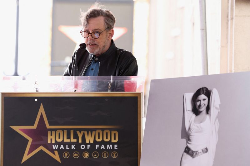 &copy; Reuters. FILE PHOTOActor Mark Hamill speaks during the posthumous unveiling of the star of actor Carrie Fisher on the Hollywood Walk of Fame in Los Angeles, California, U.S., May 4, 2023. REUTERS/Mario Anzuoni/File Photo