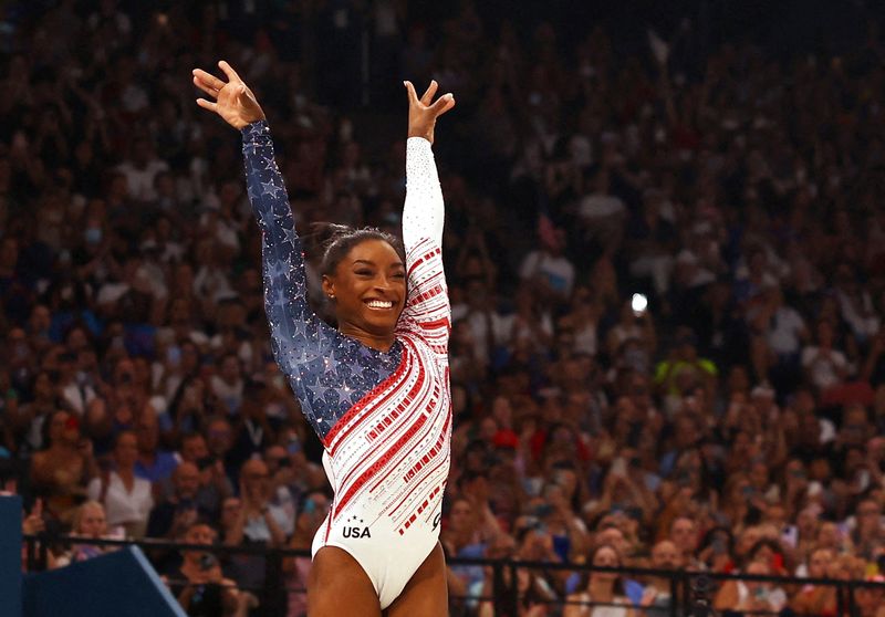 &copy; Reuters. Paris 2024 Olympics - Artistic Gymnastics - Women's Team Final - Bercy Arena, Paris, France - July 30, 2024. Simone Biles of United States reacts after her performance on the Vault. REUTERS/Hannah Mckay