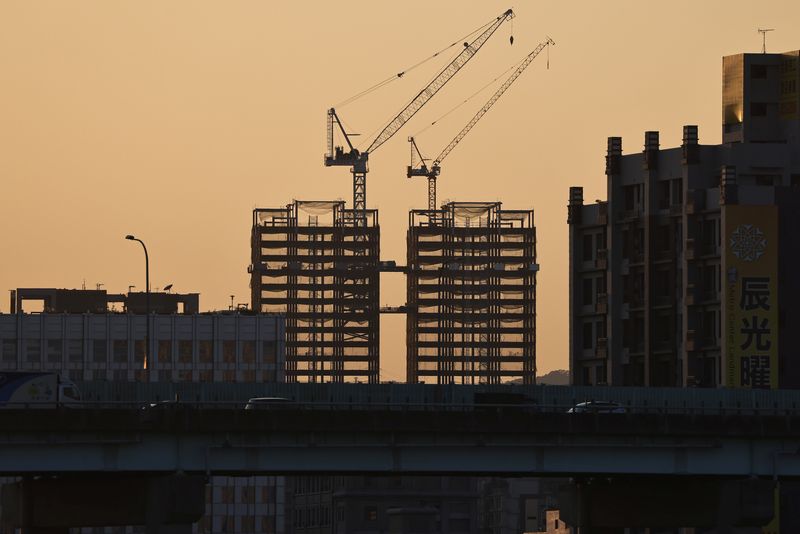 &copy; Reuters. FILE PHOTO: A construction site is seen at sunset in Taipei, Taiwan, February 19, 2021. REUTERS/Ann Wang/File Photo