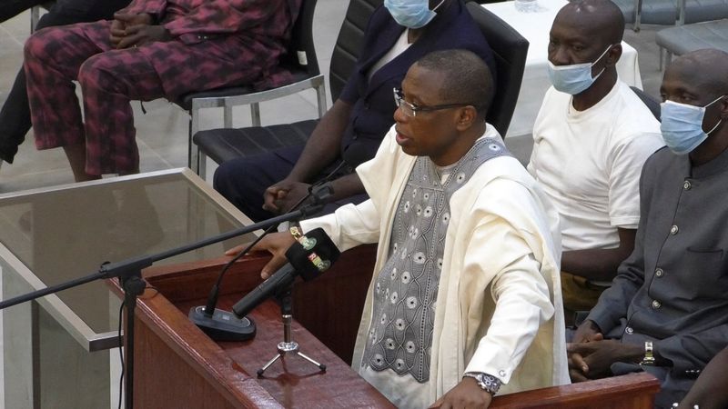 &copy; Reuters. FILE PHOTO: Guinea's former President Moussa Dadis Camara, who is accused of responsibility for the 2009 massacre and mass rape of pro-democracy protesters by forces linked to a former military junta, talks during his trial in Conakry, Guinea September 28