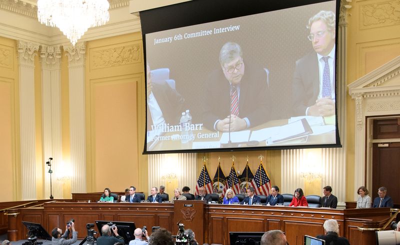 © Reuters. FILE PHOTO: A video image of then attorney general William Barr is seen on a screen as the House select committee investigating the Jan. 6 attack on the U.S. Capitol holds its first public hearing to reveal the findings of a year-long investigation, on Capitol Hill in Washington, U.S., June 9, 2022. Mandel Ngan/Pool via REUTERS/File Photo