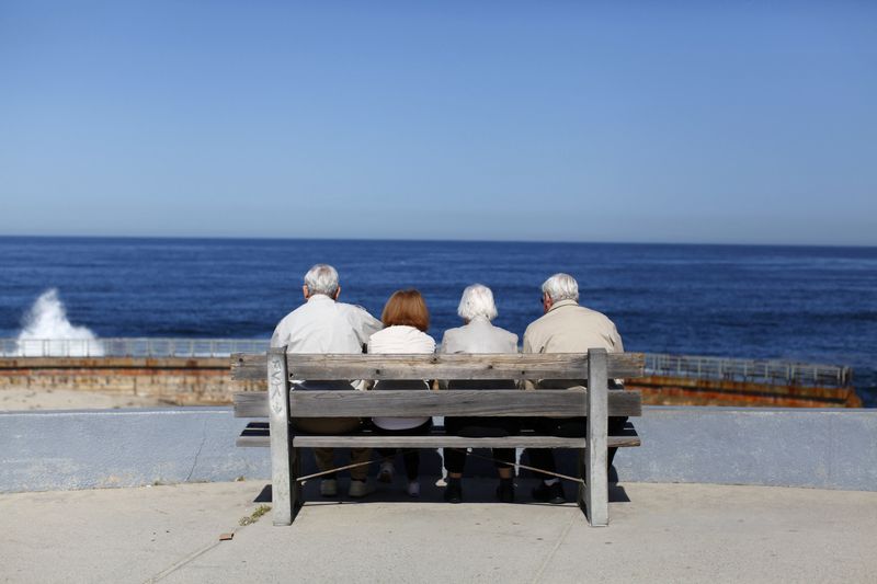 &copy; Reuters. FILE PHOTO: A pair of elderly couples view the ocean and waves along the beach in La Jolla, California March 8, 2012.  REUTERS/Mike Blake/File Photo