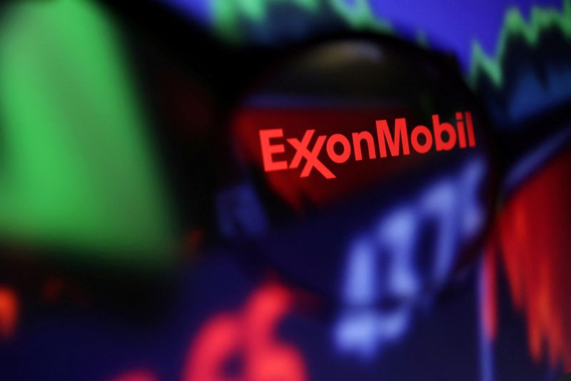 © Reuters. FILE PHOTO: Exxon Mobil logo and stock graph are seen through a magnifier displayed in this illustration taken September 4, 2022. REUTERS/Dado Ruvic/Illustration/File Photo