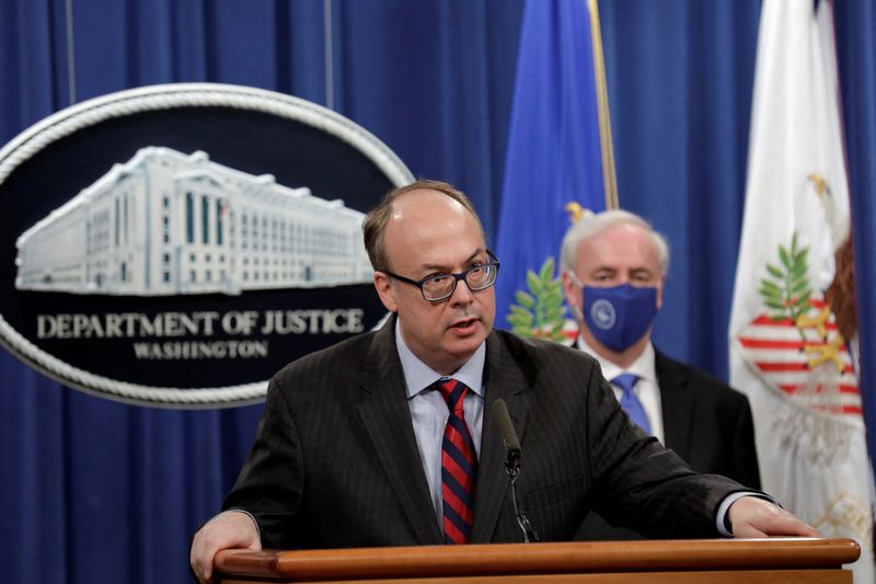 © Reuters. FILE PHOTO: Acting Assistant U.S. Attorney General Jeffrey Clark speaks next to Deputy U.S. Attorney General Jeffrey Rosen at a news conference at the Justice Department in Washington, U.S., October 21, 2020. REUTERS/Yuri Gripas/Pool/File Photo