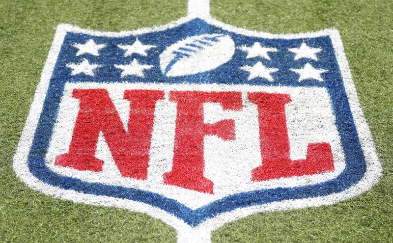 &copy; Reuters. FILE PHOTO: Aug 1, 2024; Canton, Ohio, USA;  General view of the NFL shield logo on the field at the Tom Benson Hall of Fame Stadium site of the Professional Football Hall of Fame game and induction ceremonies.  Mandatory Credit: Charles LeClaire-USA TODA