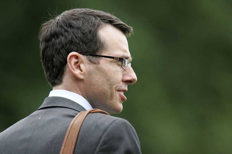 &copy; Reuters. White House senior adviser David Plouffe walks to the Marine One helicopter to depart with U.S. President Barack Obama for a day trip to Ohio and New York, from the White House in Washington, June 14, 2012. REUTERS/Jonathan Ernst  (UNITED STATES - Tags: P