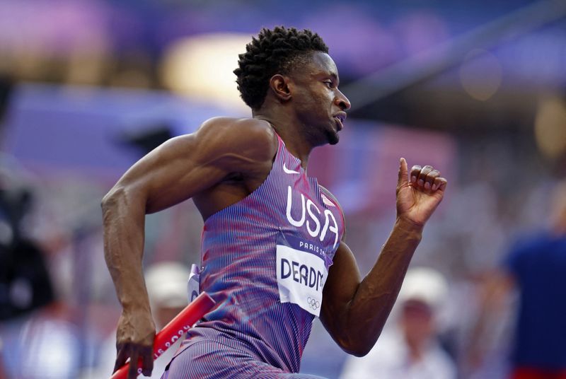 © Reuters. Paris 2024 Olympics - Athletics - 4 x 400m Relay Mixed Round 1 - Stade de France, Saint-Denis, France - August 02, 2024. Bryce Deadmon of United States in action during heat 1. REUTERS/Alina Smutko