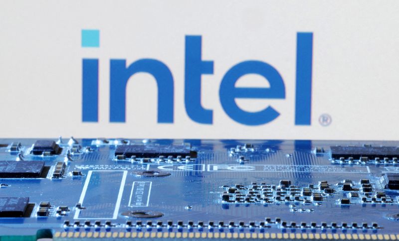 © Reuters. FILE PHOTO: Intel logo is seen near computer motherboard in this illustration taken January 8, 2024. REUTERS/Dado Ruvic/Illustration/File Photo