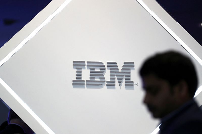 &copy; Reuters. FILE PHOTO: A man stands near an IBM logo at the Mobile World Congress in Barcelona, Spain, February 25, 2019. REUTERS/Sergio Perez/File Photo