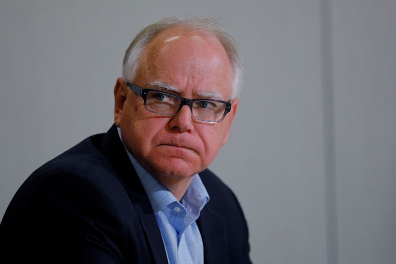 © Reuters. FILE PHOTO: Democratic candidate for Governor Tim Walz participates in a gun violence prevention roundtable with former Representative Gabby Giffords in Minneapolis, Minnesota, U.S., October 26, 2018.  Picture taken October 26, 2018.   REUTERS/Brian Snyder/File Photo