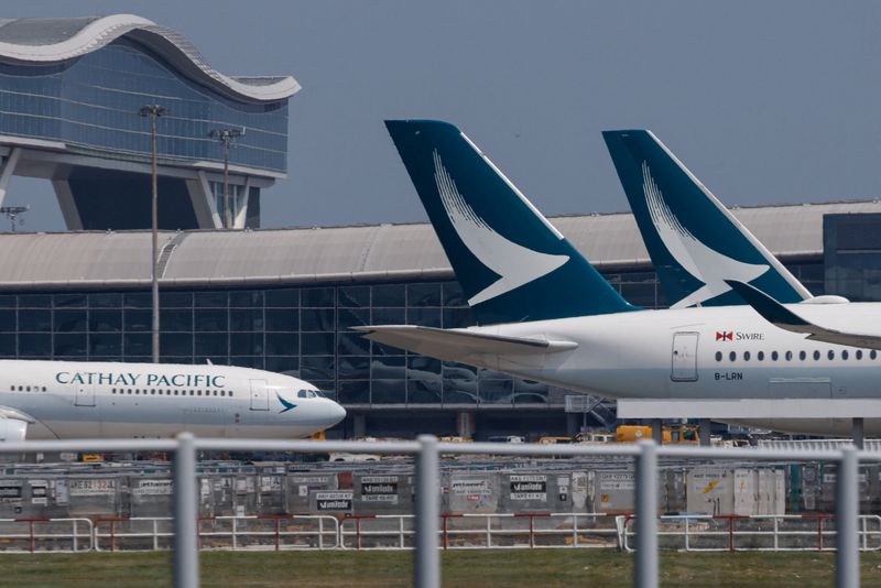 &copy; Reuters. Cathay Pacific aircraft are seen parked at Hong Kong International Airport in Hong Kong, China August 7, 2024. REUTERS/Tyrone Siu