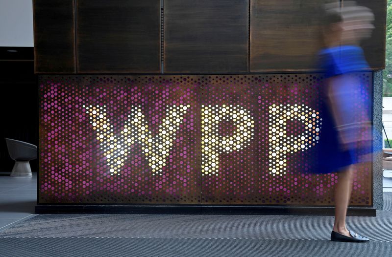 &copy; Reuters. FILE PHOTO: Branding signage for WPP, the largest global advertising and public relations agency at their offices in London, Britain, July 17, 2019. REUTERS/Toby Melville/File Photo