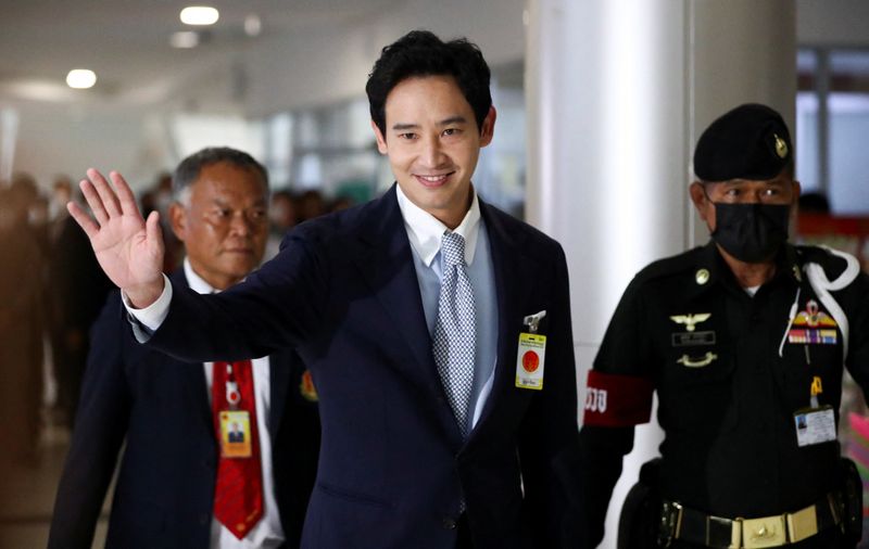 &copy; Reuters. Former Move Forward Party leader Pita Limjaroenrat waves as he walks on the day Thailand's Constitutional Court delivers its verdict on a case seeking the dissolution of the opposite group over its call for lese-majeste reform, in Bangkok, Thailand, Augus