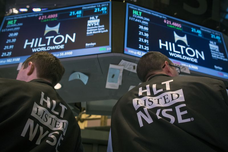 &copy; Reuters. Traders wear special vests for the Hilton IPO on the floor of the New York Stock Exchange December 12, 2013.  REUTERS/Brendan McDermid/ File Photo