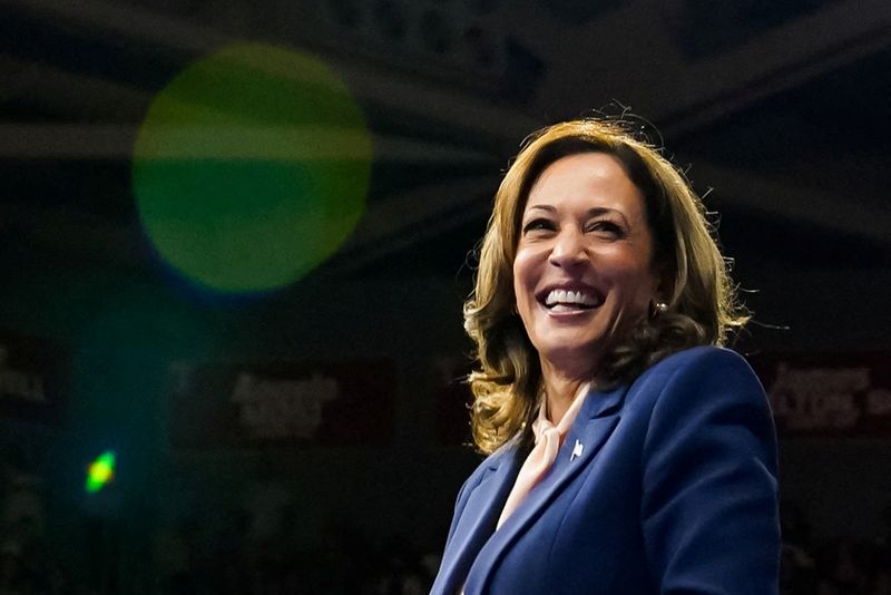 &copy; Reuters. U.S. Vice President and Democratic presidential candidate Kamala Harris reacts as she holds a campaign rally with her newly chosen vice presidential running mate Minnesota Governor Tim Walz in Philadelphia, Pennsylvania, U.S., August 6, 2024. REUTERS/Eliz