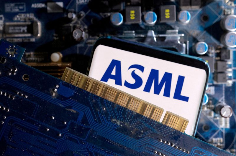 &copy; Reuters. A smartphone with a displayed ASML logo is placed on a computer motherboard in this illustration taken March 6, 2023. REUTERS/Dado Ruvic/Illustration/File Photo