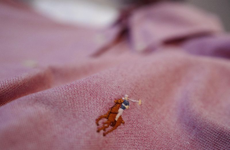 &copy; Reuters. A close up picture shows the characteristic polo player logo of U.S. fashion designer Ralph Lauren stitched on a shirt at a fashion shop in Frankfurt, Germany, March 15, 2016.    REUTERS/Kai Pfaffenbach/ File Photo