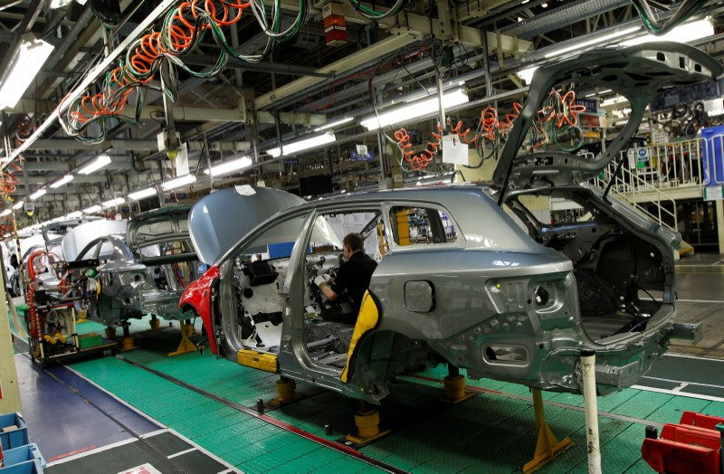 &copy; Reuters. FILE PHOTO: A man works on the production line at the Toyota factory in Derby, central England, March 7, 2011.   REUTERS/Darren Staples/File Photo