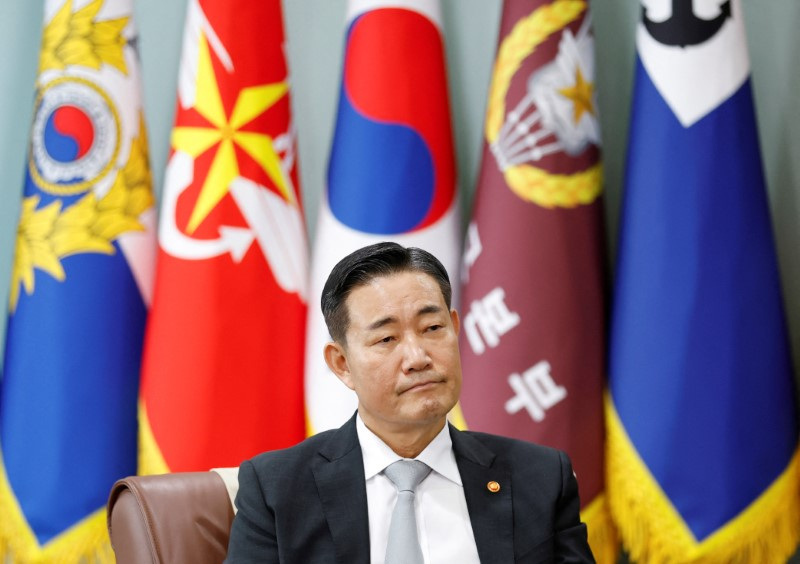 © Reuters. South Korean Minister of National Defense Shin Won-sik looks on during an interview with Reuters in Seoul, South Korea, August 7, 2024. REUTERS/Kim Soo-hyeon