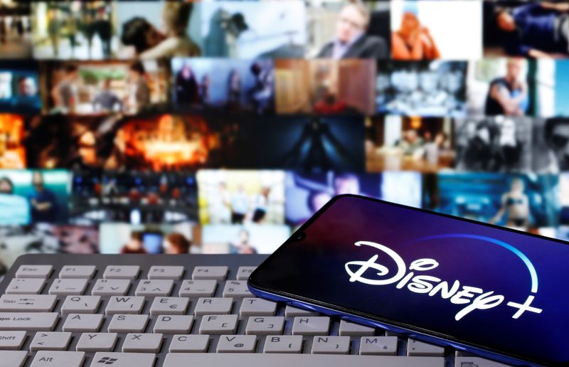 &copy; Reuters. FILE PHOTO: A smartphone with displayed "Disney" logo is seen on the keyboard in this illustration taken March 24, 2020. REUTERS/Dado Ruvic/File Photo