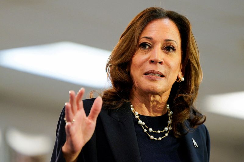 &copy; Reuters. FILE PHOTO: U.S. Vice President and Democratic presidential candidate Kamala Harris speaks during a campaign event with Democratic vice presidential candidate, Minnesota Governor Tim Walz, at the United Auto Workers (UAW) Local 900 in Wayne, Michigan, U.S