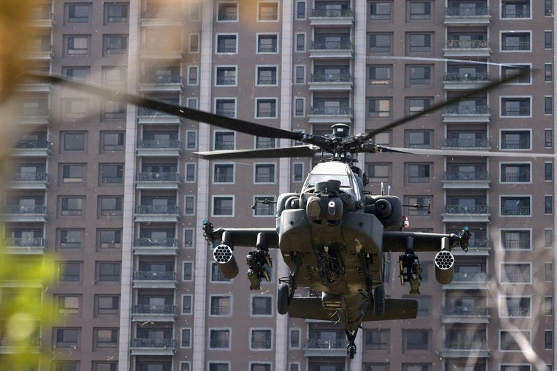 &copy; Reuters. FILE PHOTO: An AH-64E Apache attack helicopter lands during 'Combat Readiness Week' drills in Hsinchu, Taiwan, October 29, 2020. REUTERS/Ann Wang/File Photo