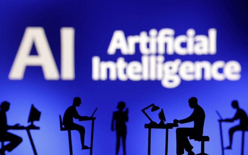 &copy; Reuters. Figurines with computers and smartphones are seen in front of the words "Artificial Intelligence AI" in this illustration taken, February 19, 2024. REUTERS/Dado Ruvic/Illustration/File Photo