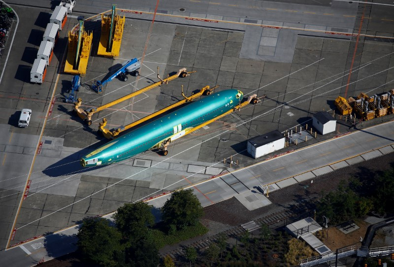 © Reuters. The fuselage of a Boeing 737 MAX aircraft is seen parked in an aerial photo at at the Boeing Renton facility in Renton, Washington, U.S. July 1, 2019. REUTERS/Lindsey Wasson/File Photo