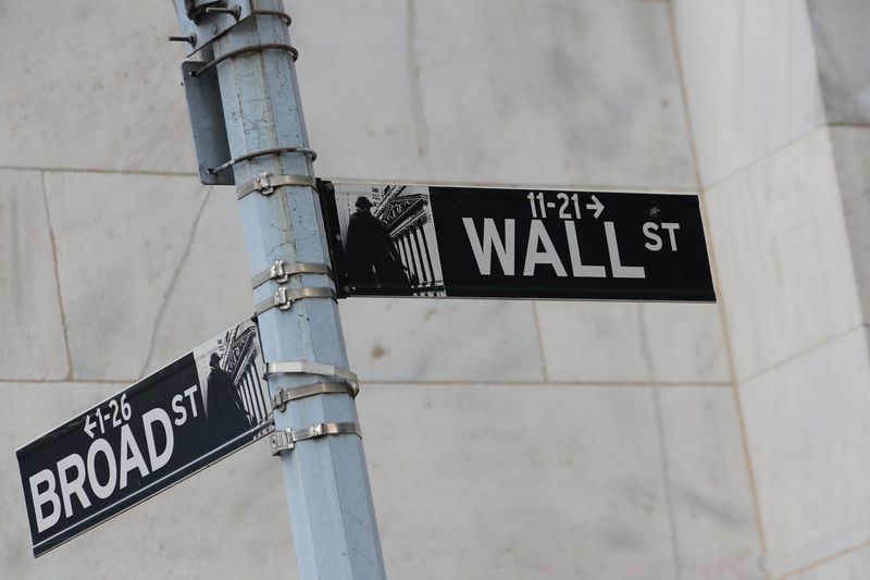 &copy; Reuters. FILE PHOTO: Street signs for Broad St. and Wall St. are seen outside of the New York Stock Exchange (NYSE) in New York, U.S., February 22, 2019. REUTERS/Brendan McDermid/File Photo