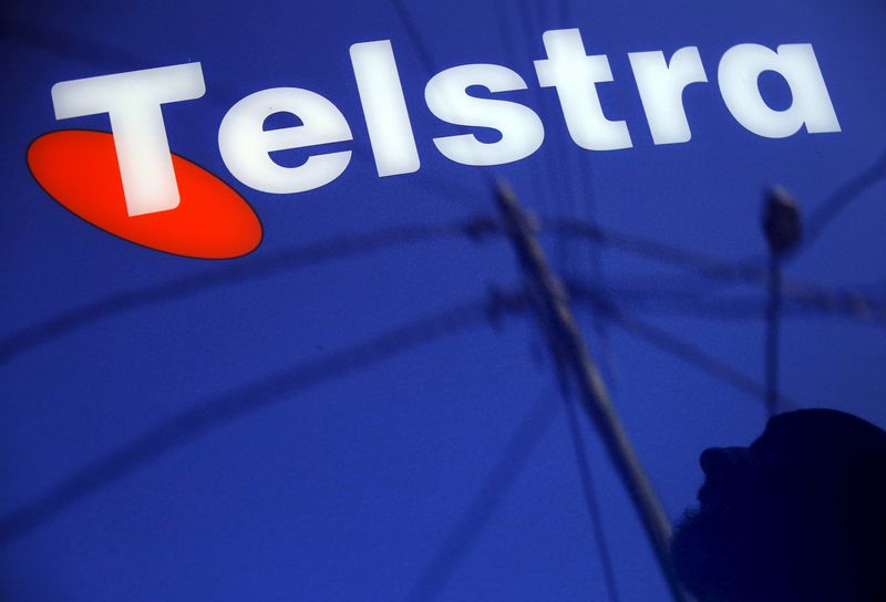 Australian telco firm Telstra's annual profit dips but forecasts brighter 2025, boosting shares