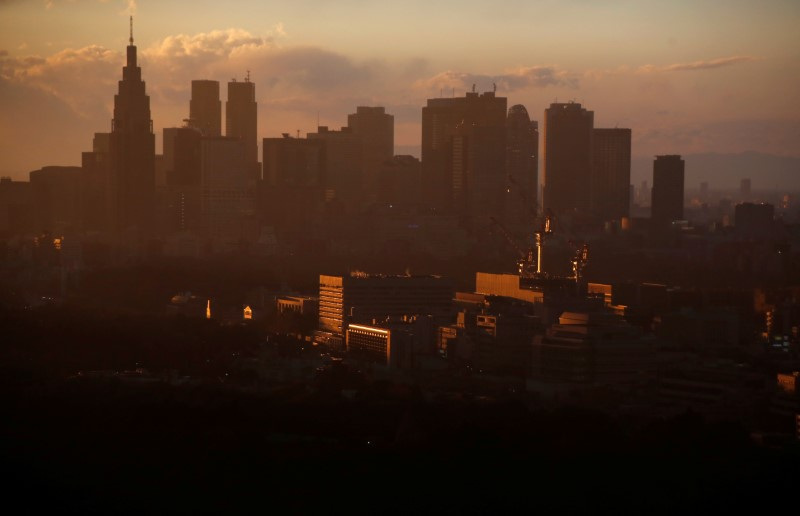 © Reuters. FILE PHOTO: High-rise buildings are seen at the Shinjuku business district during sunset in Tokyo, Japan, March 7, 2017. Picture taken March 7, 2017.     REUTERS/Toru Hanai/File Photo