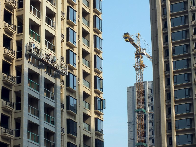 &copy; Reuters. FILE PHOTO: New apartment buildings are seen under construction in Yichang, Hubei province, December 18, 2015. REUTERS/China Daily/File Photo