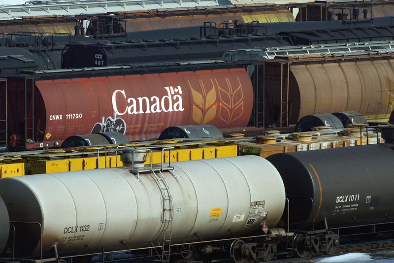 &copy; Reuters. FILE PHOTO: A wheat railcar sits at a Canadian National Railway (CN) yard in Hamilton, Ontario, February 19, 2004.  REUTERS/Andrew Wallace/File Photo