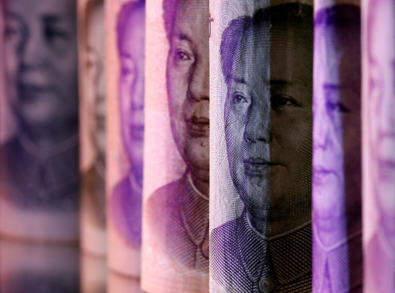 © Reuters. Chinese Yuan banknotes are seen in this illustration taken February 10, 2020. REUTERS/Dado Ruvic/Illustration/File Photo