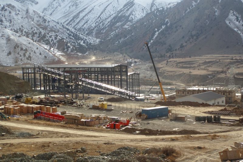 © Reuters. FILE PHOTO: A view shows facilities under construction, which are owned by TALCO Gold Chinese-Tajik antimony and gold mining joint venture, at the Konchoch deposit in western Tajikistan November 3, 2021.  REUTERS/Nazarali Pirnazarov/File Photo