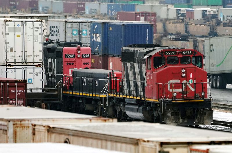 &copy; Reuters. FILE PHOTO: Trains are seen in the yard at the at the CN Rail Brampton Intermodal Terminal after Teamsters Canada union workers and Canadian National Railway Co. and failed to resolve contract issues, in Brampton, Ontario, Canada November 19, 2019. REUTER