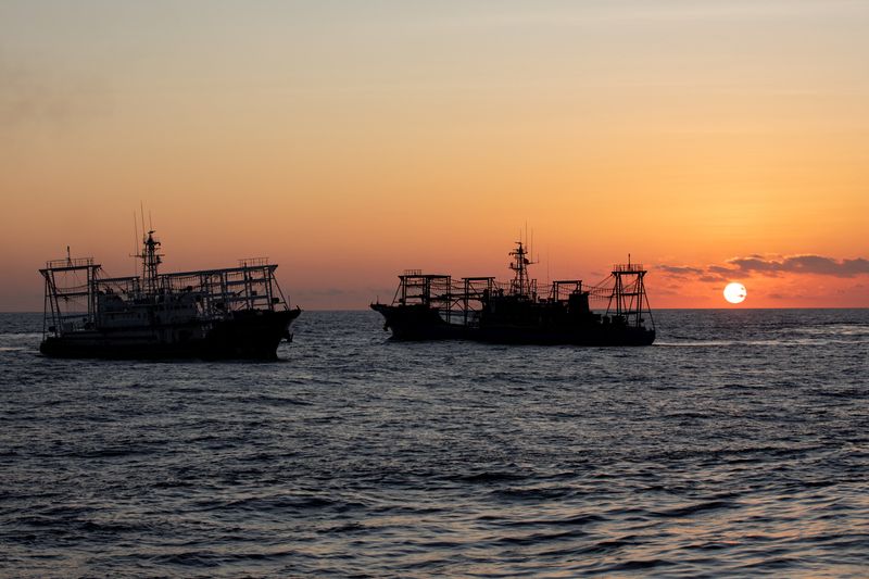 © Reuters. FILE PHOTO: Chinese Maritime Militia vessels are pictured near the Second Thomas Shoal in the South China Sea, March 5, 2024. REUTERS/Adrian Portugal/File Photo