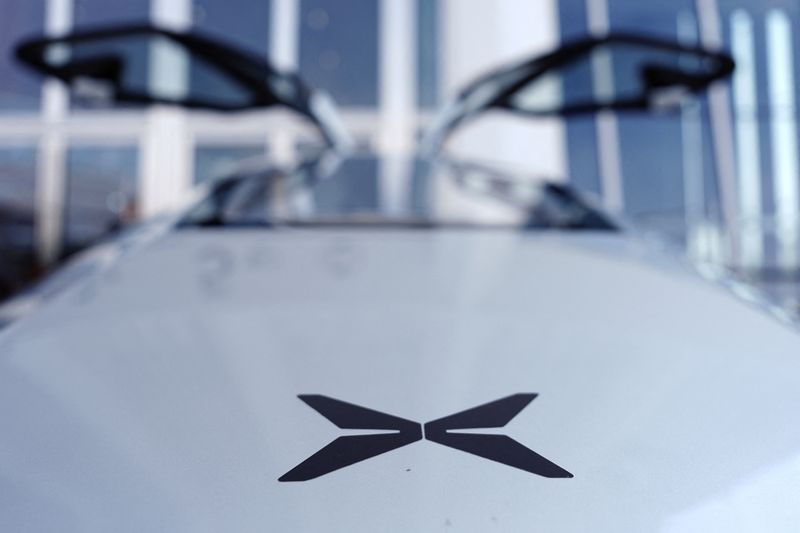 &copy; Reuters. FILE PHOTO: A logo of XPeng is seen on the electric flying car XPeng Voyager X2 by XPeng AeroHT, before a demonstration flight in Beijing, China June 18, 2024. REUTERS/Tingshu Wang/File Photo