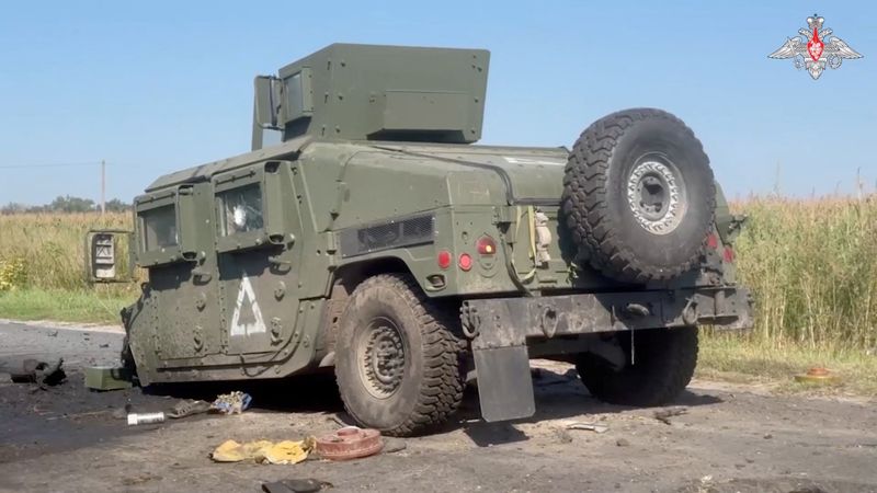 &copy; Reuters. A view shows a damaged HMMWV (Humvee), what is said to be a vehicle of a Ukrainian military convoy destroyed by soldiers of the Russian naval infantry in the course of Russia-Ukraine conflict in the Kursk region, Russia, in this still image from video rel