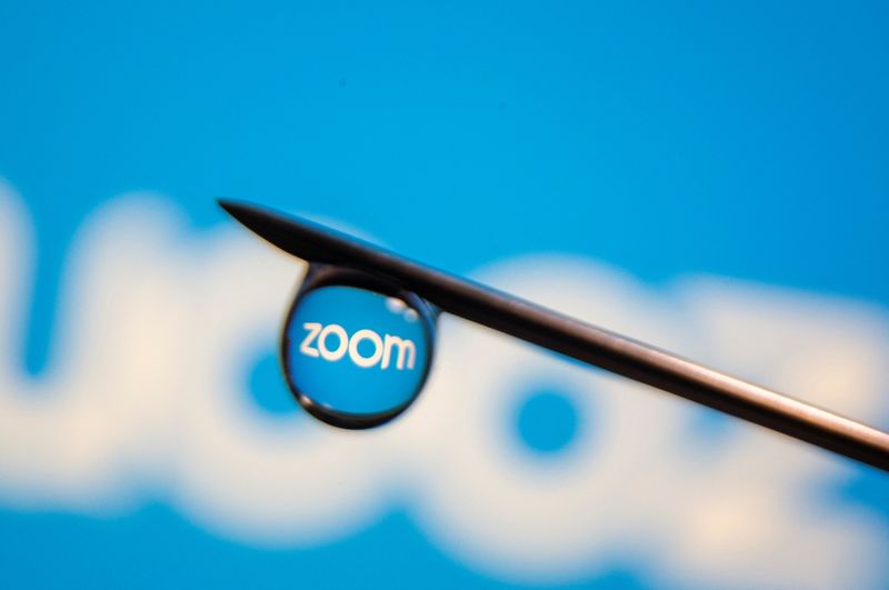 &copy; Reuters. FILE PHOTO: Zoom app logo is reflected in a drop on a syringe needle in this illustration photo taken March 16, 2021. Picture taken March 16, 2021. REUTERS/Dado Ruvic/Illustration/File Photo