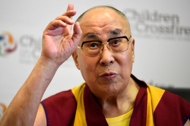 &copy; Reuters. FILE PHOTO: Tibetan spiritual leader the Dalai Lama, Patron of Children in Crossfire, gestures during a press conference in Londonderry, Northern Ireland September 11, 2017. REUTERS/Clodagh Kilcoyne/File Photo