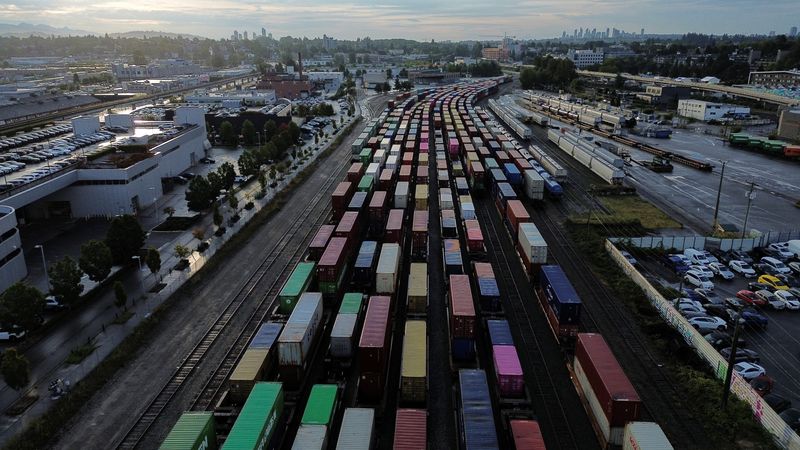 &copy; Reuters. A drone view shows a freight train and box cars sitting idle at a Canadian National Railway Co. Yard after the company locked out workers during an ongoing contract dispute in Vancouver, British Columbia, Canada August 22, 2024. REUTERS/Jesse Winter