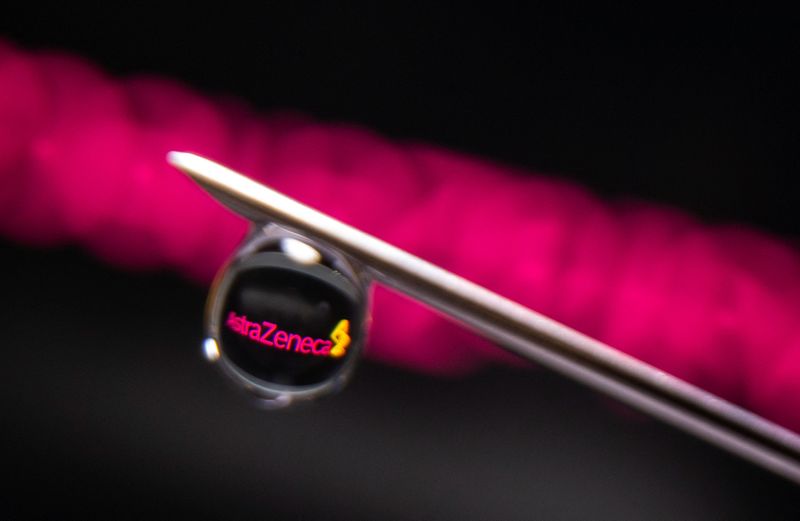 &copy; Reuters. FILE PHOTO: AstraZeneca logo is reflected in a drop on a syringe needle in this illustration photo taken March 16, 2021. Picture taken March 16, 2021. REUTERS/Dado Ruvic/Illustration/File Photo