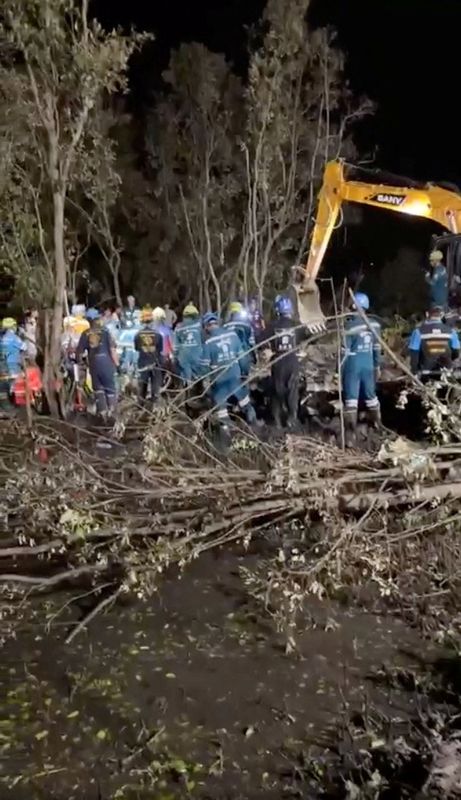 &copy; Reuters. A view of rescue and search operations underway at the site of a fatal plane crash, in Bang Pakong, Chachoengsao province, Thailand, in this screen grab obtained from a social media video. Bang Pakong News/via REUTERS