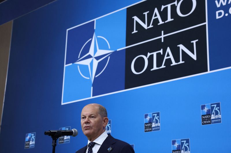 &copy; Reuters. FILE PHOTO: Germany's Chancellor Olaf Scholz speaks during NATO's 75th anniversary summit in Washington, U.S., July 11, 2024. REUTERS/Yves Herman/File Photo