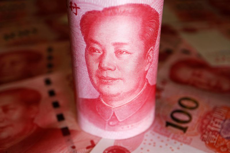 © Reuters. FILE PHOTO: Chinese yuan banknotes are seen in this illustration picture taken June 14, 2022. REUTERS/Florence Lo/Illustration/File Photo