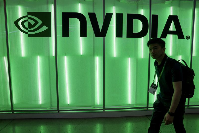 © Reuters. FILE PHOTO: A person walks pass a Nvidia logo at Computex in Taipei, Taiwan June 5, 2024. REUTERS/Ann Wang/File Photo