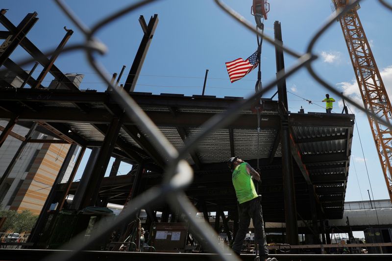 &copy; Reuters. FILE PHOTO: Workers install steel beams on high-rise building under construction in Boston, Massachusetts, U.S., June 30, 2021. REUTERS/Brian Snyder